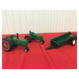 Two Oliver toy tractors and wagon