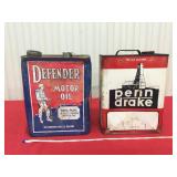Two empty vintage 2 gallon metal canisters