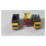 Three Diecast Dump Trucks
