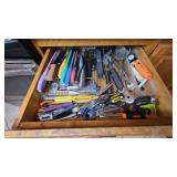 Kitchen Drawer with Assorted Tools and Utensils