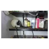 Shelf With Gardening and Maintenance Items