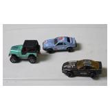 Three Die-Cast Toy Vehicles