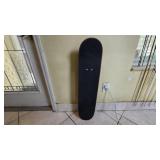 Complete Skateboard with Black Deck and Wheels