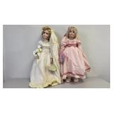 Four Porcelain Dolls with Outfits