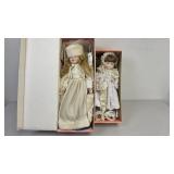 Two Boxed Porcelain Dolls with Accessories