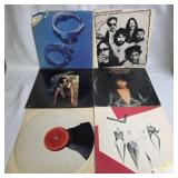 Six Vinyl Records With Covers