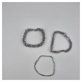 Three Silver-Tone Bracelets