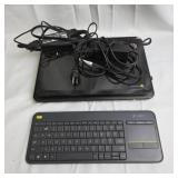 Two Laptops and Logitech Keyboard