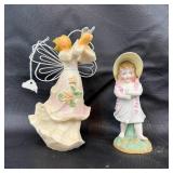 Two Ceramic Figurines With Angel and Girl
