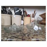 Two Clear Glass Juicers