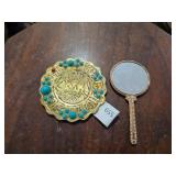 (L) Tibetan - style amulet (R)Vintage hand mirror