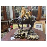 Figurine of Two Children Riding a Water Buffalo