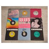 Nine 7-Inch Vinyl RecordsFeaturing Various Artists
