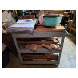 An Industrial Three-Tier Rolling Utility Cart