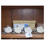 Four Decorative  Ornaments with Metal Bases