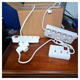 Group of European Power Strips and Adapters