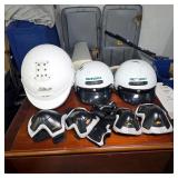 Group of Helmets and Hyper Protective Gear