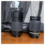 Group of Nikon Zoom Camera Lenses and Cases