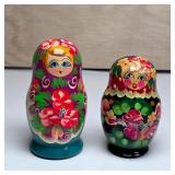 Two Sets of Painted Russian Nesting Dolls