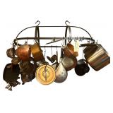 METAL HANGING POT RACK W/ ASSORTMENT OF COOKING POTS, PANS, AND SKILLETS TO INCLUDE REVERE WARE, TAGUS, AND OTHERS; CAST IRON SKILLET; COOKIE CUTTERS; SMALL ASSORTMENT OF KITCHEN UTENSILS; MILK STRAIN