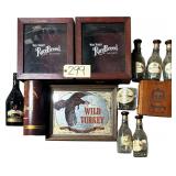 WILD TURKEY MEMORABILIA: 2 SHADOW BOX TYPE BOTTLE CARRIERS, 5 GLASS BOTTLES, DRINKING GLASS, CARDBOARD CYLINDER; VINTAGE WOODEN CIGAR BOX; OTHER LIQUEUR BOTTLE