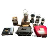 CAMPING LOT: GLOW MASTER STOVE, BBQ-PRO STOVE, 2 OTHER PROPANE STOVES, ELECTRIC STOVE EYE, COLEMAN STOVE, COLEMAN LANTERN, GE LANTERN, COLEMAN TABLE LAMP, ETC.