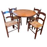 WOODEN (CHERRY FINISH) SHAKER STYLE DINING TABLE APPROX. 40” DIAMETER W/ 4 MATCHING CHAIRS