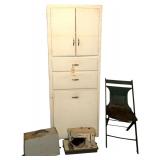 1920S/30S STYLE WOODEN KITCHEN CABINET AS-FOUND W/ CONTENTS; VINTAGE SINGER PORTABLE SEWING MACHINE; VINTAGE METALLIC CHAIR AS-FOUND