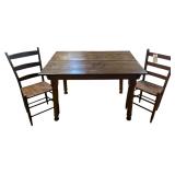 ANTIQUE/PRIMITIVE HARVEST STYLE WOODEN DINING TABLE W/ 2 WOVEN BOTTOM LADDER BACK CHAIRS (ONE CHAIR READY TO BE RESTORED)
