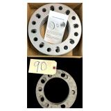 4 NEW IN BOX TRAILER WHEEL SPACERS, 2 SMALLER TRAILER WHEEL SPACERS