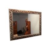 LARGE BEVELED GLASS MIRROR WITH ORNATE FRAME - VIEWING AREA APPROX. 39.5” X 29.75”