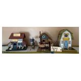 THREE DECORATIVE BIRD HOUSES: ONE IS A COUNTRY STORE, ONE CHARLIE