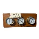 BAROMETER, THERMOMETER, AND HUMIDITY GAUGE ON WOODEN PLAQUE