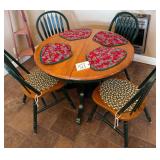 ROUND TABLE AND FOUR CHAIRS - 42 INCH ROUND TABLE STANDS ABOUT 29 INCHES TALL WITH GREEN BASE
