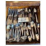 ASSORTMENT OF FLATWARE TO INCLUDE KNIVES, FORKS, TEASPOONS, SERVING SPOONS, ETC.