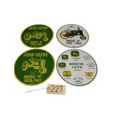 4 METALLIC EMBOSSED JOHN DEERE SIGNS APPROX. 11.75” DIAMETER