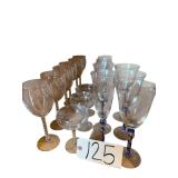 9 TWISTED STEM WINE GLASSES, 3 BLUE STEM WINE GLASSES, 2 BLUE STEM CHAMPAGNE GLASSES, 3 ETCHED CHAMPAGNE GLASSES
