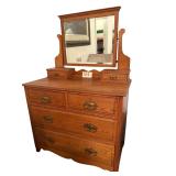 ANTIQUE VICTORIAN OAK DRESSER W/ GLOVE BOXES AND SMALL BEVELED MIRROR - 2 DRAWERS OVER 2 DRAWERS - APPROX. 29.5” TALL X 36” WIDE X 19.5” DEEP
