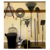 WALL LOT: 2 SHOVELS, HOE, PUSH BROOM, 2 RAKES, SPRAYER, RUBBERMAID GARBAGE CAN, 2 GRILL GRATES, CRAFTSMAN PRUNER, SHEPHERDS HOOK, METAL DUST PAN