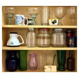 ASSORTMENT OF GLASS: COLORED VASES, COFFEE MUGS, CANISTERS WITH LIDS, 2 GREEN GLASS MARGARITA GLASSES, 2 STEMMED CLEAR MARGARITA GLASSES