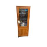 2 WOODEN ENTERTAINMENT STANDS W/ 3 GLASS SHELVES, GLASS DOOR, AND WOODEN DOOR - EACH APPROX. 58.5” TALL X 21.5” WIDE X 19.5” DEEP - TO INCLUDE SAMSUNG DVD PLAYER, LG BLU-RAY PLAYER, JVC VCR PLAY