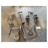 COLLECTION OF ANTIQUE FARM TOOLS AND KITCHEN IMPLEMENTS, INCLUDING A STEELYARD BALANCE SCALE, SUGAR NIPPERS, A CHERRY PITTER, A BILLHOOK OR SICKLE AND TWO HAND-CRANKED MEAT GRINDERS