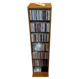 CD SORTER RACK TO INCLUDE ARTISTS SUCH AS GARTH BROOKS, CLINT BLACK, ALABAMA, DIAMOND RIO, ALAN JACKSON, COLIN RAYE, AARON TIPPIN, AND MANY MORE