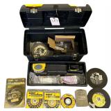 STANLEY PLASTIC TOOL BOX WITH ZIRCON SONIC MEASURING TOOL, LASER LEVEL, CRAFTSMAN NUT DRIVERS, MASONRY CONCRETE 7.25 CUT OFF BLADES, 2 NIP 4 INCH FULL CABLE TWIST WIRE WHEEL