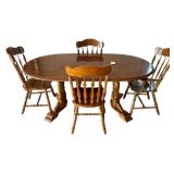 WOODEN PEDESTAL DINING TABLE APPROX. 72” LONG 42” WIDE INCLUDING LEAF W/ 4 CHAIRS