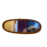 OVULAR MIRROR IN APPEARS TO BE OAK FRAME - APPROX. 17” X 47”