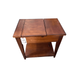 WOODEN SIDE TABLE W/ FLIP-UP TOP AND ELECTRICAL OUTLETS APPROX. 24” TALL X 16” DEEP X 32” (OPEN)/24” (CLOSED)