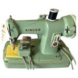 SINGER MODEL 185-J SEWING MACHINE CIRCA 1960S W/ BUTTON HOLE MAKERS, NEEDLES, BOBBINS, AND OTHER SEWING NOTIONS