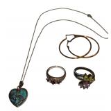 Two size 7 925 Sterling Rings; one has garnet look stones, the other has multicolor stones, also sterling with goldwash hoop earring, turquoise pendant on chain