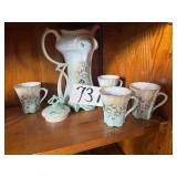 VINTAGE CHOCOLATE POT WITH LID AND 4 CUPS FEATURING DAISY DESIGN; BEARS A “LIMOGES” MARK THAT DOES NOT APPEAR AUTHENTIC